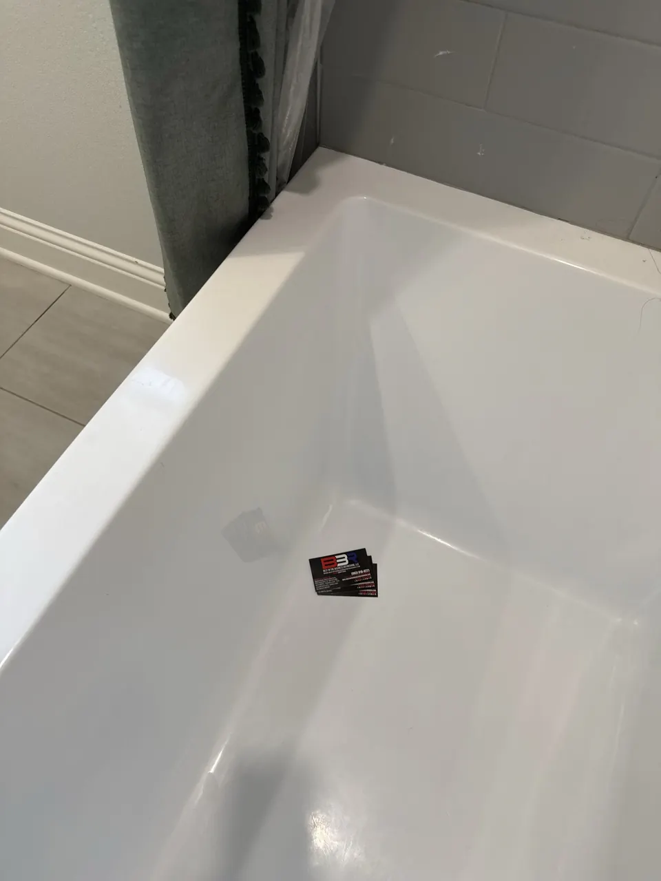 Close view of white fiberglass tub surface